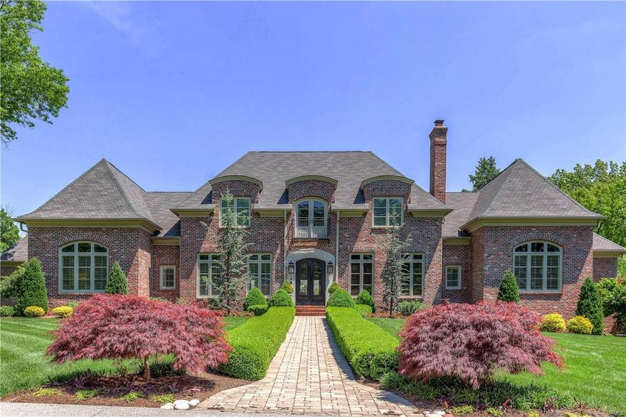 CONTINUE TO SHOW.Fabulous & elegant,  1.5 story open floor plan in a prime location! The gourmet kitchen features custom cabinetry, 2 dishwashers, Wolff & Sub-Zero appliances, walk-in pantry & Butler's pantry with wine fridge.  Living room has French doors on either side of the fireplace leading to the patio that features a full masonry  fireplace. The incredible master bedroom suite features a gas fp, door leading to the private patio, separate dressing room w/ built-in drawers including Sub-zero fridge,  & 2 custom walk-in closets. The 2nd main floor bedroom is en-suite. The wood-paneled den features built-ins & gas fireplace. Upstairs are 3 en-suite bedrooms, family area & utility room w/ washer and dryer.  The amazing walk-out lower level features 3000 bottle wine cellar, work-out area, large bedroom, full bath & family room w/ fireplace, kitchen & walk-out to  pool area. The heated pool can be used year round & features a retractable safety cover & waterfalls.  Est. sq ft is 8643.