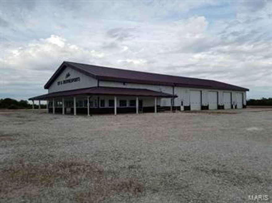11.4 acres of US HWY 24 frontage and approximately 9500+ vehicles per day.  2 miles from US 36/24 intersection.
10,000 sq. ft. retail and repair facility.  Additional 1000 sq. ft second level apartment
Set up for a RV and camper service center: interior and exterior water, electric, and sewer dump
Suitable as a repair or storage facility for many types of vehicles, machinery, or equipment
Security fence surrounding the property boundary
Gravel lot suitable for heavy equipment with 8-12" base
Location is great for investors because of the proposed location of the Hannibal by-pass. Location: High Traffic, Hwy/Interstate Frntg