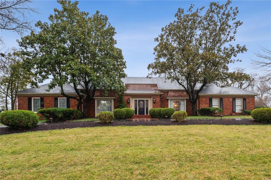 Renovated "Roy Beal" built 4BD, 1.5-sty gem in sought after Frontenac neighborhood.  The home is situated on a 1 acre level wooded site in Ladue Schools. Updates between 2015-22 include a new kitchen and baths, wood floors, new electric service, interior paint, light fixtures, and wiring. You will notice the granite countertops, Wolf gas cooktop & oven, and stainless-steel appliances in the center island Kit/w- breakfast bar. The main floor primary suite has 4 closets plus a porcelain tile floor, jet tub, and a separate shower in the luxury bath. The spacious great room has a beamed ceiling, built-in bookcase, stained glass windows, and gas fireplace. Upper level has 2BD, 1 Bath plus storage and unfinished attic space. Other amenities include a main floor laundry room with a sink, closet, and both hanging and cubby storage, quartz and granite countertops, porcelain and ceramic tile, and Home Protection Plan for the buyer. Location, size, condition, and value--this one has it all!