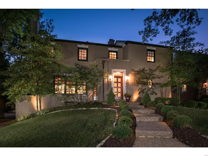 Exceptional NEW price for this amazing 2 sty Clayton Gardens home, just a brief walk to Clayton's finest restaurants, park, shops & grocery. You'll feel very welcomed into this 4 bed, 3 full & 2 half ba home w/over 3,145 sq. ft. The original home was given a major remodel in 2003 & new energy with a main level-lower level-2 car garage addition. This main floor hearth/breakfast/kitchen is cheerfully bright with floor to ceiling window elevations, drawing in an abundance of natural light. Also on the first is the Featured luxurious main floor master suite. The current owners added a "Signature" outdoor living space off the hearth room. This space features a 28 ft vaulted wood plank ceiling, beams, ceiling fan, built-in speakers; windows w/plantation shutters; wide plank wood floors; a fl to ceiling stone wall w/a gas fp & mounted flat screen. The 2 south elevation openings are accented w/roll down designer shades. When opened, the space over looks the stone patio and the Clayton skyline. Additional Rooms: Sun Room