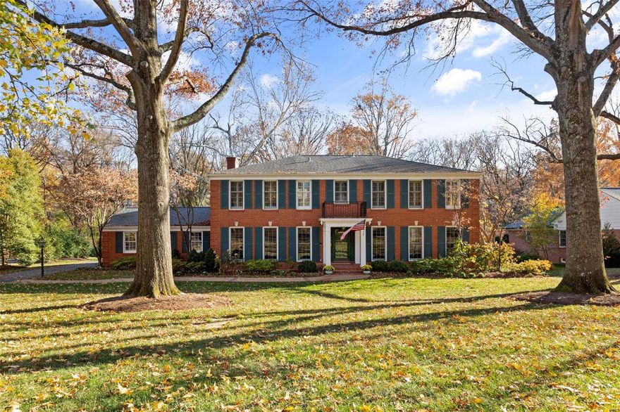 Welcome to this well-appointed colonial home perfectly situated on a highly sought after Ladue street.  Upon entry, you will find a graceful, large living room that flows seamlessly into the light filled dining room with a beautiful bay window.  Beyond the dining room is the chef's kitchen with upgraded appliances and an abundance of counter, cabinet, & pantry space.  Great for family time and entertaining, a hearth room adjoins the kitchen featuring cubbies and access to the wonderful brick patio which overlooks this serene property.  A cozy den, perfect for work at home, rounds off the main living space.  Upstairs, a fabulous primary suite with a newly renovated, tranquil bath and dual closets.  There are also 4 oversized bedrooms that share two crisp and updated hall bathrooms.  The lower level is perfect for entertaining with a wet bar, full bath, and huge rec room that walks out to the rear yard.  Gather family and friends for a lifetime of memories in this timeless home.