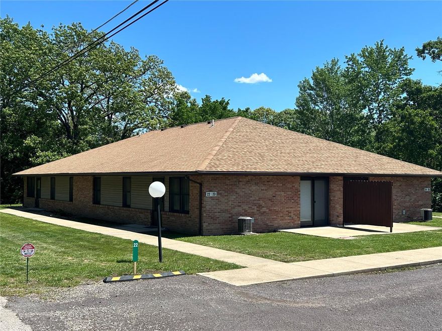 H2203 - Fresh new paint in each room goes hand in hand with our fresh new lowered price on this great unit.  The HOA covers snow removal, grass cutting, the in-ground pool and much more. This unit is in a convenient corner location set towards the end of the complex with very little traffic.  The vinyl flooring in the rest of the home is in good shape, as are the appliances, which will stay.  The units have something for everyone. The elderly will enjoy the peace of mind of the shared common yard areas and not having to do any outside yard work.  Younger people can own their own home for the same money as renting. In fact similar units, even without the patio area and entrance, are currently being rented at over $900 per month.  The in-ground pool is available for all members, but is often empty in the summer months and just waiting for you to come and enjoy it.   Take a look at this cute 2 bedroom, 1 bath home today. Location: Corner Location, End Unit, Ground Level