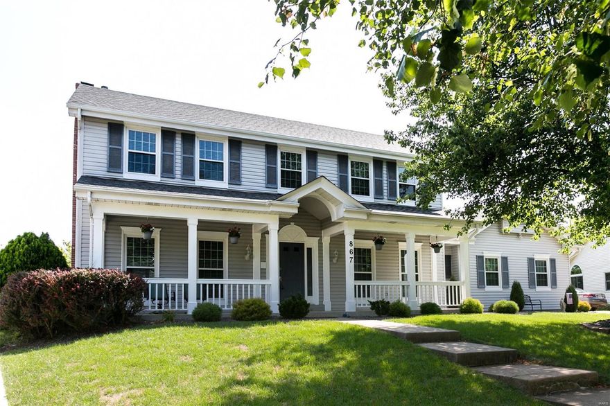 Exceptional quality in details throughout this beautifully restored spacious 4 bedroom 2.5 bath two story home, located in Westridge Manor Estates. Before entering this home, you will notice a wonderful full length porch next to an oversized 2 car side entry garage.       Inside, you will find a center hall plan including a 2 story entry foyer with  an open staircase with nice millwork. Additionally, there is a living room, dining room, family room with a wood burning fireplace, and a beautiful kitchen with new appliances, granite, and a bay window. Upstairs you will find renewed bathrooms and bedrooms, freshly painted, new lighting, some walk in closets, and new flooring. The lower level has 2 activity rooms, and lots of storage. Don't miss this immaculate home.