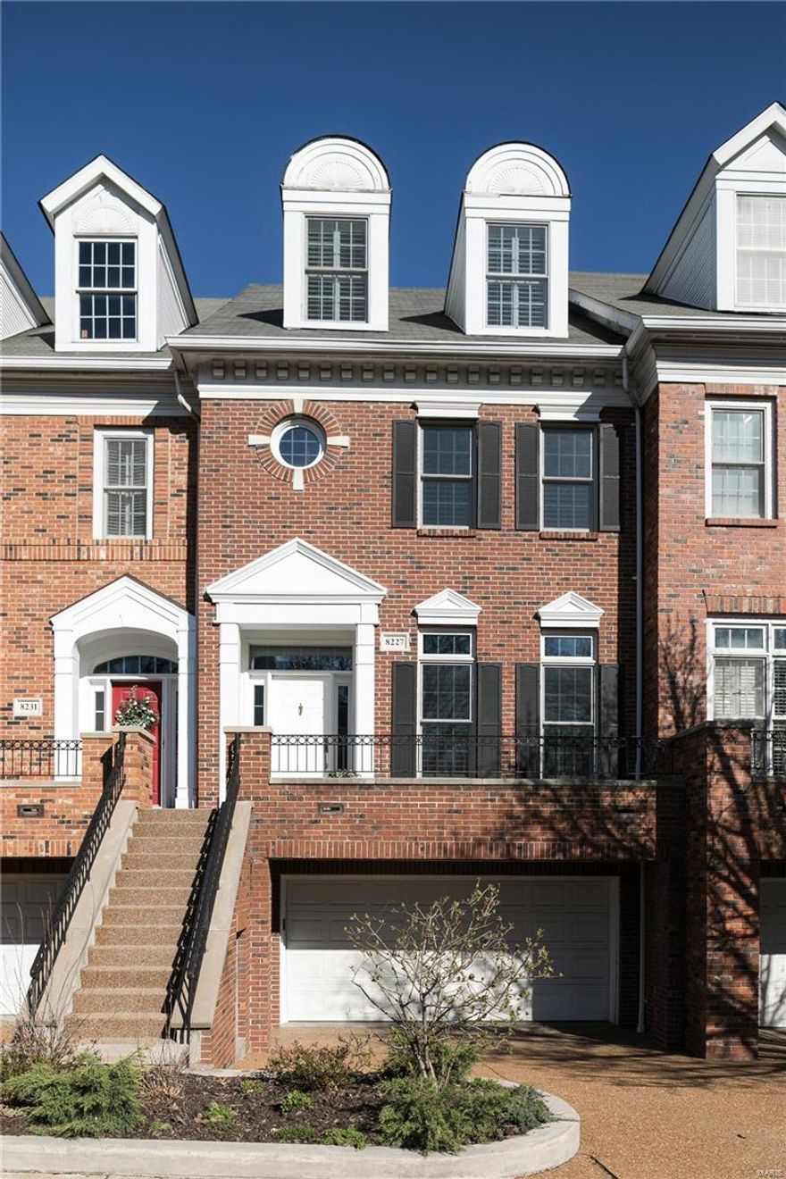 Showings start 4/6. A Clayton home that lives like a Townhome/condo BUT NO monthly or yearly fee and the views of the park & downtown Clayton skyline are gorgeous! Once inside, the living rm, has built in bookcases flanked by a fireplace w hardwd laid on the diagonal. Entertain in the dining rm w curved entry to the RENOVATED kitchen, breakfast area & family rm, & private deck. Upstairs is a open area, great for an office, Master suite w walk in closet, renovated  spa like bath w soaking tub, full shower w marble surround, his & her vanities, a make up station & private water closet. A guest suite & laundry rm w utility sink, closet, cabinets & folding counter. The 3rd level is incredible space-a loft area w vaulted ceilings & the 3rd bedrm suite. Just over 3000 sq. ft. of living space, private 3 car parking, newer roof, new carpets, fresh paint, open stair case to all levels, unfinished workout rm tons of storage & closet space. This is not part of a condo complex but lives like one! Location: Downtown