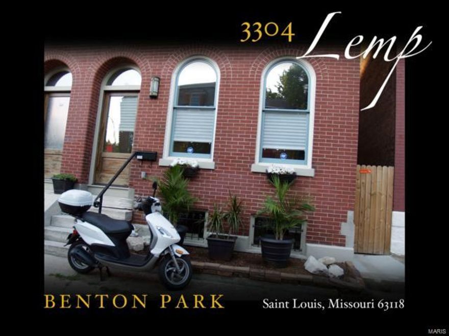 Updated Benton Park Row House. AS-IS SALE! Enjoy this wonderful large open floor plan w/many high-end finishes. It offers a stunning kitchen with granite counters, stainless steel appliance, large island with gas cooking, custom cabinetry and a good sized pantry.  There is a half bath on the 1st floor, a deck for summer BBQ's and a fenced back yard with motorized gate allowing for secure parking of three or four cars. The first floor has bamboo flooring. The 2nd level has (3) nice sized bedrooms, one full bath located in hallway that features a dual sink vanity with concrete counter top. There is also a private laundry closet with washer/dryer in hallway and a deck off the back bedroom. The basement is a cool space that is partially finished & also has lots of unfinished storage. Enjoy walkable hip Benton Park living with access to restaurants, bars, cafés and so much more. Cherokee Street, Soulard, the Brewery, Downtown and so many other cool things in the city are all within minutes.
