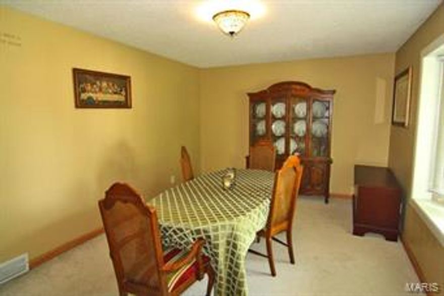 Convenient living areas in this freshly painted updated quad level.  Enjoy the private backyard with nice patio and no maintenance deck when the weather is nice or cozy up to the fire indoors when it's not.  New roof and security system!