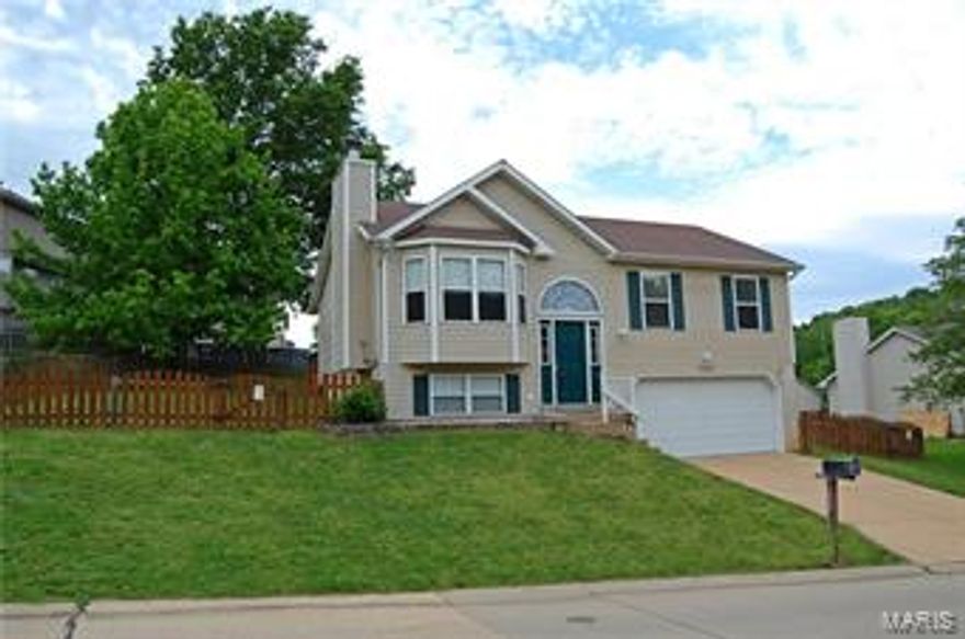 Check out this 3 Bedroom/2 Bath Move In Ready Home located in Bayberry Farms subdivision.  This home was completely renovated three years ago with new lighting, bath fixtures, kitchen countertops, carpeting, gas stove, dishwasher, microwave & garage door w/opener.  Current owners just installed brand new Pergo Wood Flooring throughout Main Level in Living Room, Dining Room & Hallway.  Very large and completely fenced yard with deck is perfect for kids to play or entertaining guests.  This one will not last long!