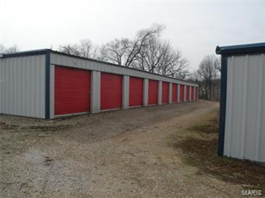 INCOME PRODUCING! Newer 52 Unit Storage Sheds. 3 Buildings, Fenced Sides & Rear. Room to Build at least 2 more Units & Could Offer Outside Storage Also. Great Location Just Outside of Town, Easy Access. Location: Hwy/Interstate Frntg
