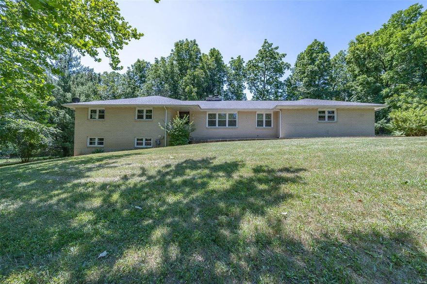 Beautiful large brick home with over 3,100 sq ft. of living area. Home features a large entry foyer, expansive living room, nice sized dining room and kitchen area, 4 bedrooms, wood burning fireplace and all kinds of extra space. Outside features a sizable fenced in back yard perfect for entertaining. The basement is partially finished with a bedroom/family room area, full bath and extra storage space. This home is PERFECT for any family. All this located just minutes from schools(Waynesville RVI school district), shopping, I-44 access and much more. Approximately 10 minutes from the West Gate of Fort Leonard Wood. Call today to schedule a showing.