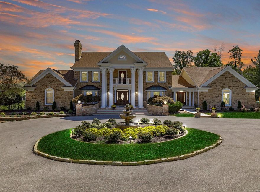 24 spacious & elegant, renovated, upgraded and MOVE IN READY rooms!! The 2 story marbled entry foyer features a spectacular Romeo & Juliet staircase leading to 4bd/2ba upstairs, freshly painted trim and walls, brand new baths,(all 7 of them!) The kitchen includes new Miele appliances, quartz counters, Bev fridge, ice maker, induction and Sous Vide cooking, a cooks’ dream, walk-in & Butlers Pantry! Stunning, 2 story granite Great room, wet bar & custom fireplace, & French doors to 2 composite decks. The main floor Master suite features a bath that is a marble tile masterpiece! Den, M/F laundry, huge 3 car garage, 6899sf above grade! But there’s more - downstairs is 3400+sf finished (total 10,000+sf!) w/ full kitchen, Media Room, Rec room, exercise room, bedroom, 2 full bathrooms, & a greenhouse! New painted trim & walls, neutral grey carpeting and loads opportunities!  Bring your inlaws or extended family! This home can easily accommodate separate living areas for multiple generations! Some Accessible Features