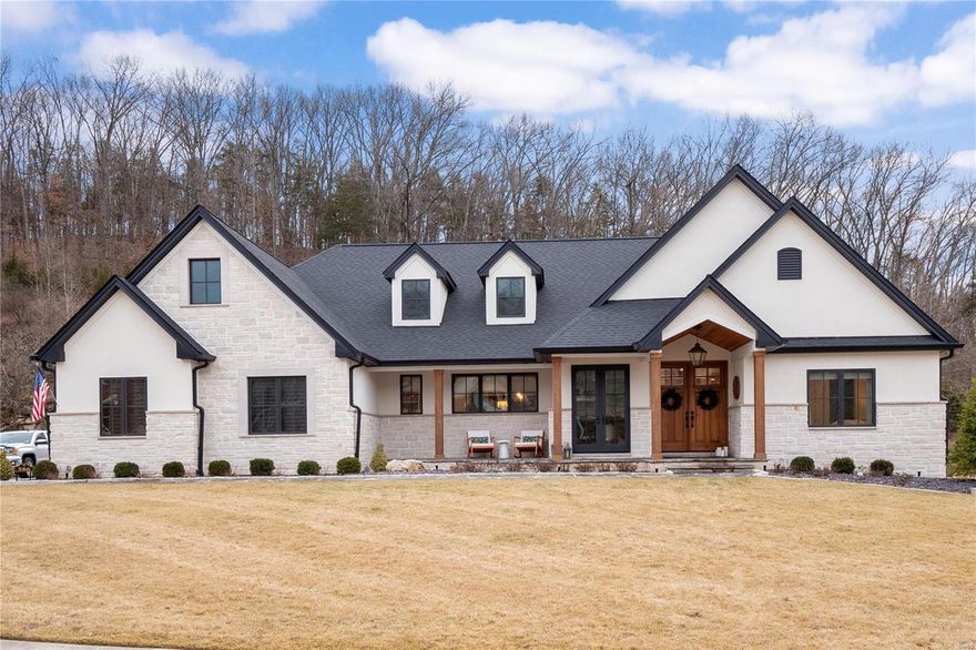 Welcome home to this ONE-year-old custom McKelvey build in beautiful St. Albans! Reap the benefits of a custom-built new construction home without going through the headaches & uncertainty of building. This home flaunts it's Indiana limestone & stucco façade, complemented by black Pella windows/doors. Upon entering you’re immediately enthralled by the custom 12’ ceiling w/ wood beam accents throughout the main living area. The custom kitchen w/ Beck Allen cabinetry & Charme Quartzite countertops is flanked by a convenient wet bar w/ Belmont stone accents to match living room fireplace. French oak hardwood flooring runs throughout the home. Main floor laundry room connecting to the primary closet is ideal. Primary bedroom & den/lounge have direct access to covered patio boasting retractable screens & built-in heaters in ceiling. Big, flat backyard perfect for a pool. Lower level is partially finished with 3rd bedroom & en-suite, & plenty of additional sq footage waiting to be finished. Additional Rooms: Mud Room