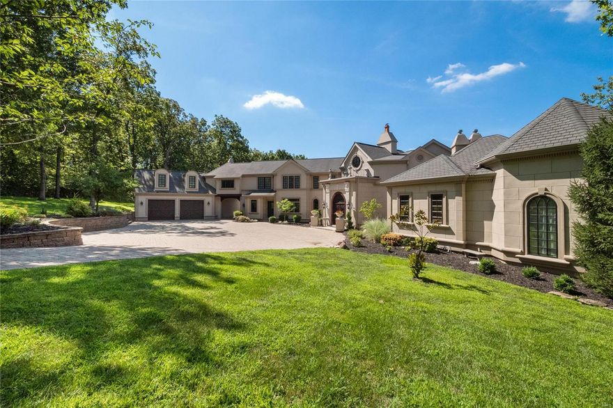 Ignore days on market, Seller was finishing basement and slowly moving out of the home. Just had new photos shot in August/2019. Stunning Custom Home in a prestigious gated community on 3 private acres! This unique home will WOW you with approx. 9,500 fin.  sq/ft, a porte-cochere, Belguard pavers and a 4 car garage. The landscaping was professionally designed with a beautiful lighting system. Beautiful hardwood floors, main floor laundry and even a French Steam Shower. You'll love to entertain in this gourmet kitchen w/ custom cabinetry, butlers pantry, granite, sub-zero & 6 burner gas cook top. Detailed Iron work, Custom wood work & arched doorways, 20 ft. Ceilings & an abundance of windows throughout the home. Upstairs you'll find 2 living areas, perfect rec room for kids & theater room. The walk-out Lower Level recently finished w/ an additional 3,000 sq/ft (approx.) w/ plenty of room for entertaining. Plenty of storage space, The back yard is a lovely setting w/ fire pit & patio.