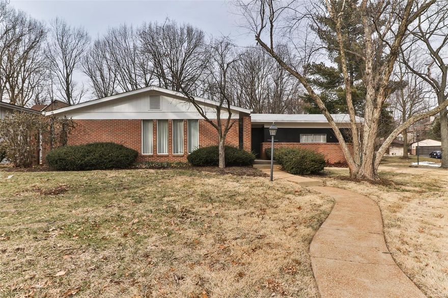 Teardown or time to redecorate? You decide, but either way you'll end up in a GREAT location in Ladue School District. Incredible potential! Impressive setting on the 1/3 acre lot. Living room-dining room combination is wonderful for entertaining and, like most rooms in the home, appears to have wood floors under the carpeting. Eat-in kitchen with its retro-now-stylish wallpaper will be where everyone wants to sit around and talk. It has a large pantry and lots of counter space. Central to the family room is a gas fireplace for those oh-so-cozy winter nights. 2 car garage off of this  room. 3 bedrooms and 2 baths complete the upstairs. Downstairs is partially finished with a recreation room, but the possibilities are endless, especially since there is already a half bath and it's a walkout. Add another bedroom, an office, or more hang-out space. Roof is only 1.5 years old; newer HVAC. If you want to tear it all down and start again, you've got plenty of company in this area. AS IS SALE