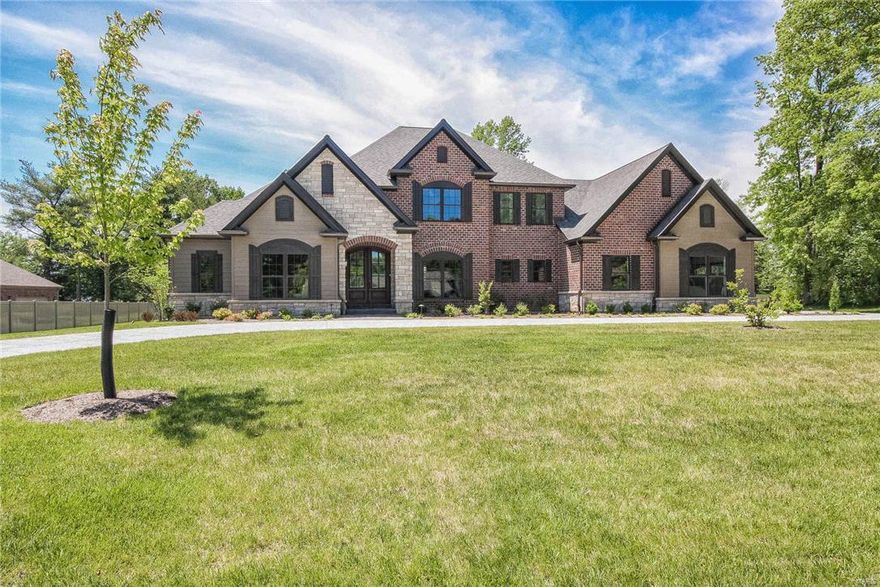 Stunning 1.5sty by Berkley Construction, on 1+ acre, w/4Bds, 6Bths (4F/2H) & 4400+ sqft. Custom Mahogany front door & grand 2sty Foyer; archway to Dining Rm & Study w/wood beamed ceiling. Gorgeous Great Rm w/box beamed ceiling, gas frplc & wall of windows. Incredible Kitchen w/custom cabinets, granite tops & center island w/breakfast bar, pantry, Butler’s pantry & Brkfst Rm.  Bright & airy Hearth Rm w/WB frplc; Powder Rm, Mud Rm & Laundry Rm. Master Ste w/His & Her closets, door to patio & luxury Bth w/heated marble flrs, His & Her vanities, walk-in shower & gorgeous tub. 2nd Flr w/Loft, 3 Bds, all en-suite & convenient 2nd Flr Laundry. Highlights: hand-scraped wood floors, arched openings & doorways, custom moldings, O/S 3-car garage, circular drive, zoned HVAC, alarm, sprinklers, central vac & deep pour LL. Relax on patio & enjoy the large, level backyard ~ perfect for a pool! Great location ~ close to shops, restaurants, parks & hwys! Top Rated Parkway Schools! Additional Rooms: Mud Room