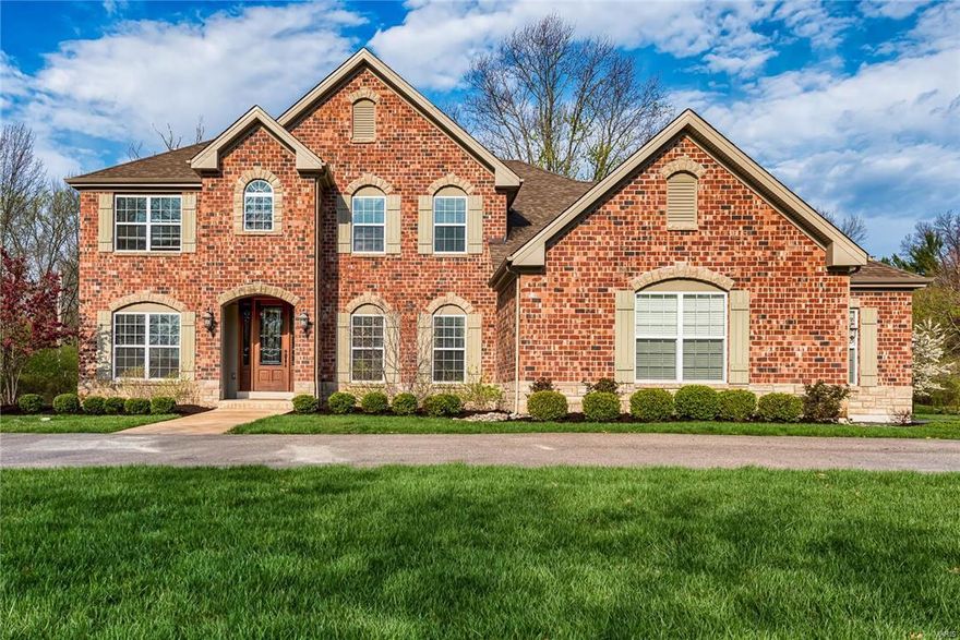 Like new, eight year old custom built Berkley home situated on beautiful level large lot in great Creve Coeur neighborhood.  Well appointed, with formal dining room, office and two story light filled great room, which flows into exquisite kitchen and hearth room.  Luxurious first floor master suite and bath will not disappoint!  Lovely staircase leads to spacious second floor open sitting room in addition to the three bedrooms and two baths.   Not to be missed finished lower level with sophisticated theater and sound system, several large entertaining areas, bar/kitchen bedroom and outstanding bath.  Don’t miss out on this exclusive property in great close in location.  Perfect condition!