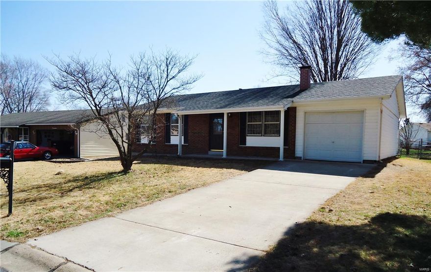 Refreshed ranch ready to go! 3 bedroom 1.5 baths sparkling house ready to be your 'home'. Great room with wood burning fireplace and refinished hardwood flooring.  Kitchen and breakfast room are filled with natural light, oak cabinetry, stainless front Whirlpool appliances, ceramic back splash, updated fixtures and French door leading to the patio and large level fenced yard.  Master bedroom suite as well as the 2nd and 3rd bedrooms have refinished hardwood flooring and ceramic surround in bath.  Hall bath has been updated with new laminate flooring, freshened tub and vanity, ceramic surround, new fixtures.  Freshly painted throughout, 6 panel doors, updated fixtures, ample closets and storage, enclosed soffits and fascia, covered front porch, newer roof, over-sized 1 car garage with space for lawn equipment or workshop area.  Don't miss out on this move-in ready ranch!