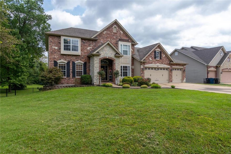 CHECK OUT OUR VIDEO TOUR!!!  Stunning 1.5 story brick stone home.  Two story great room with wood burning stone fireplace & beautiful wall of windows overlooking a custom in-ground concrete pool. Pool features a custom rock waterfall & almost 3/4 acre of land in the heart of South County. Large Kitchen & breakfast room with open arch & bar open to great room! Built in shelves in hearth room & great room. Large master bedroom suite with coffered ceiling & bay windows overlooking park like setting! Huge master bath with double vanities, separate shower & large garden tub! 3 additional huge bedrooms upstairs with Jack and Jill bath, walk in closets in every room, main floor laundry, maintenance free deck, 3 car garage, 10 foot ceilings in basement & much, much more! You won't want to miss this one!
