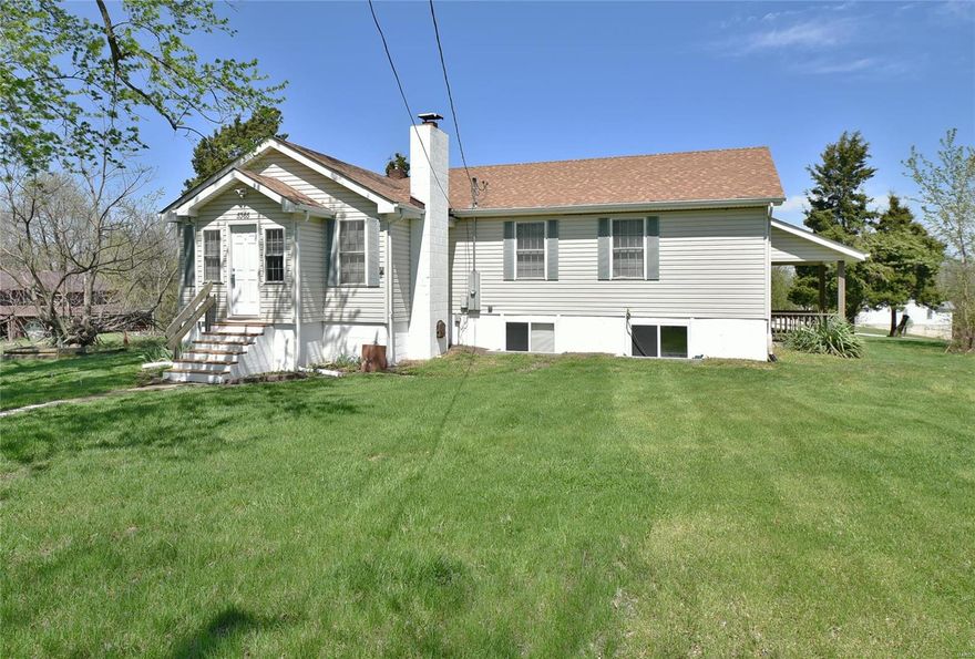 Nestled upon a sprawling 5.3 acre part wooded lot with a private pond, this terrific 3+ bed/3 bath ranch residence is guaranteed to impress! The inviting open floor plan welcomes you with an oversized living room featuring a toasty wood burning fireplace that will keep everyone warm on chilly nights. The space flows naturally into the adjacent dining room where a long breakfast bar connects to the bright kitchen with ample custom cabinetry, stainless appliances & a walk-out to the part covered deck & large privacy fenced patio. The main floor laundry is a nice feature. Retire in true comfort to the generously sized master suite with a walk-in closet & private full bath.  The expansive finished walk-out adds a central family room with sliding glass walk-out, den, bonus room, workshop & the 3rd full bath. Two of these rooms could be used as 4th and 5th bedroom.  You will love living in the middle of these wide open spaces!  2-10 Year Home warranty provided! No show till Sat. 4/20.