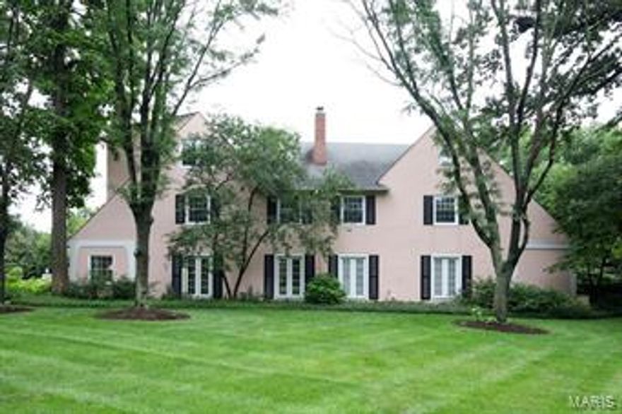 Terrific new price!!!!! An opportunity presents itself!  This pink Ladue landmark is beautifully situated on an acre off South Price and under a lush canopy of mature trees.  This two-family dwelling combines sophisticated style with significant rental income opportunity.  This property incorporates the charm of an English country cottage (smaller, lease property with 3 beds and 3 1/2 baths) with an open, contemporary main dwelling interior including a first floor master, floor-to-ceiling windows and doors with 2 additional bedrooms and 2 full baths upstairs and a beautiful private courtyard with inviting terrace and pool.  Additional features include two over-sized and attached garage spaces for each dwelling.