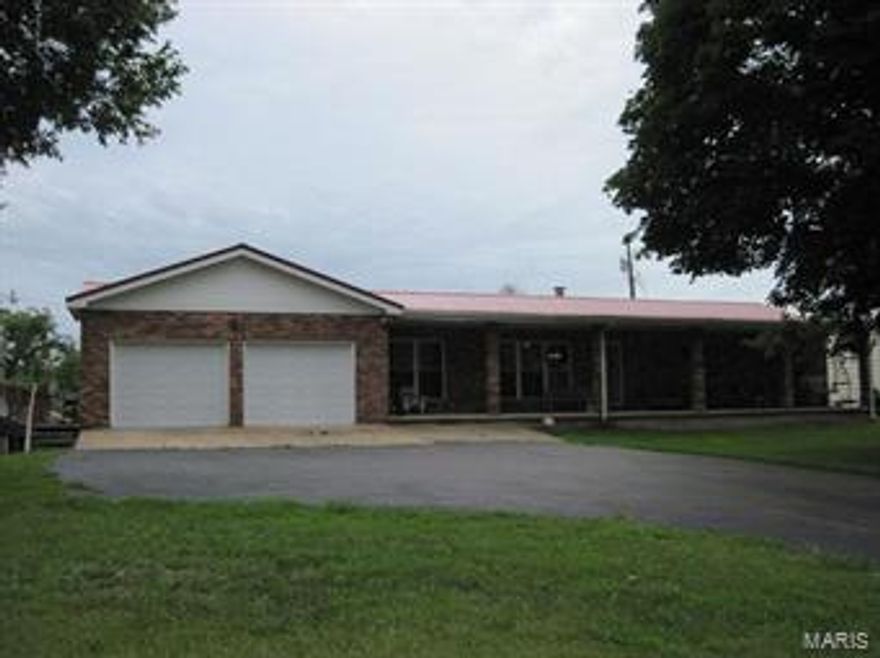 HUGE PRICE REDUCTION on a working cattle farm located in the heart of the Ozarks! 497 acres of lush green grass, large trees, several springs, 5 ponds, and three quarters of a mile on the Huzzah River! Main home has 3 bedrooms, 2 bath with beautiful kitchen cabinets, full basement, 2 car attached garage, and lots of living space. Second home is a charming rock home built in 1941 with 4 bedrooms, and 1 bath. Second home is currently rented, and would be perfect for a mother-in-law quarters! 70 acres of hay bottomland, with around 300 round bales being cut each year. 4 Stocked ponds with bass, redear, catfish, bluegill, and crappie! This property also features 4 wells, fenced and cross fenced, scale barn, cattle working facilities, chicken coop, and much more! This property is mostly open with scattered trees throughout, and backs up to the Mark Twain National Forest with excellent hunting! This family farm has been in the family since 1887, and owner has run up to 200 head of cattle!