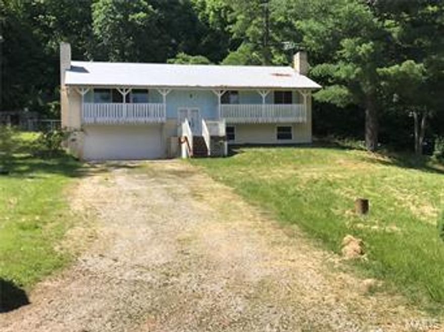 Looking for SPACE that is private and secluded?  This Raised Ranch home sets on over 11 acres. 3 bedrooms with 2 full baths and 1 half bath.  Partially finished lower level, 2 car tuck under garage and an attached 2 car garage or workshop.  This home needs work and is being Sold AS IS only with no warranty written or implied.  Seller has no knowledge of the property and will do no inspections or repairs.  Cash or Conventional loan only.  Seller instructs buyer to close at True Title Company. SpecialListingConditions: Probate