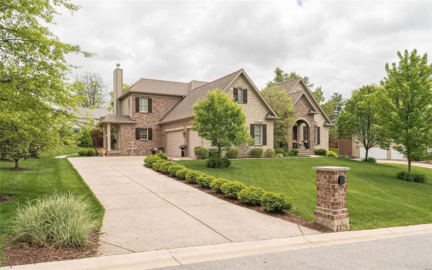 FALL IN LOVE with this meticulous, inviting, 1.5 story brick/stone custom stunner in DESIRABLE LADUE School District. Beautifully landscaped w/ in-ground sprinkler sys. LOCATION: minutes to Clayton, Premium shops, Airport, Private schools and fine dining. Fantastic lot w/large patio, old thyme lights, open floor plan, perfect for entertaining. Amenities galore! Gorgeous mahogany entrance door, hardwood flooring, walls of windows, superb architectural finishes, extensive robust millwork on interior archways/walls, 3-tier crown, plantation shutters, various ceiling heights, floor to ceiling custom stone fireplaces, impressive gourmet chef's extended kitchen w/high-end appliances & cabinetry, butler's pantry, wine cooler. 1st floor laundry w/cubbies, private bath/extended cabinetry, coffered ceilings, luxury master bath, octagonal ceilings, jet tub, heated stone floor, upper bedrooms each w/private bath/walk-in closets, bonus room, surround sound, central vac & SO MUCH MORE! Visit today!