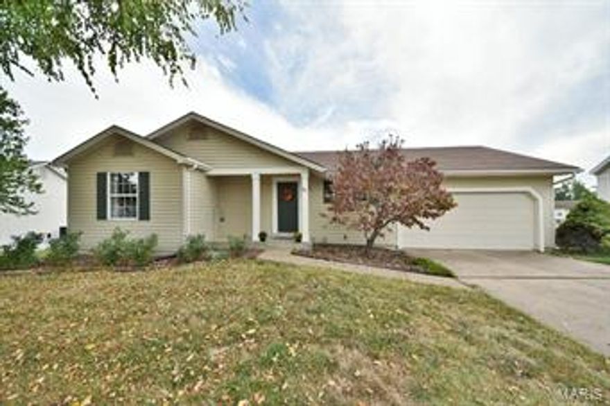 Tucked away on a peaceful subdivision you'll absolutely love to come home to, this wonderful 4 bed/3 bath ranch offers an inviting open floor plan you'll be certain to enjoy. The wide open floor plan boasts tall vaulted ceilings stretching above the great room, dining room & kitchen creating a spacious quality throughout the main living spaces. A sunny atrium walk-out grants access to the huge elevated deck with a terrific view. Retire in comfort to the nice-sized master suite where you'll find full length mirrored closet doors & a private full bath. The finished walk-out lower level adds the 4 bedroom, 3rd full bath, recreation room & family room with walk-out to the back patio & sprawling yard. Convenient parking with the attached 2-car garage & additional off-street parking. New carpets in all upstairs bedrooms - installed September 2015. Treat yourself with an Appointment Today!