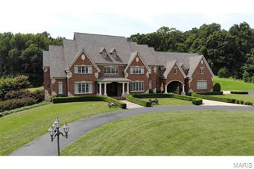 Truly breathtaking! This is an incredible property and a great opportunity for a fabulous private estate or a developers dream!  42 acres on LaSalle and backing to Co Rd 618 with a private gate.  There is a 10,000+ sq. ft. English custom built home with outstanding finishes including 5-6 bedrooms, 5 full, 3 half baths, gourmet kitchen, 6 fireplaces, in-ground pool, pool house with fireplace, and half bath.  Hand carved two story fireplace mantel, library, media room, custom bar and so much more.  There is a heated barn plus 4 other outbuildings.  The property is fenced/cross fenced and perfect for horses or there are a numerous beautiful building sites around the property and it features a gorgeous lake!  Owner will consider selling more land (24.74 more acres available)