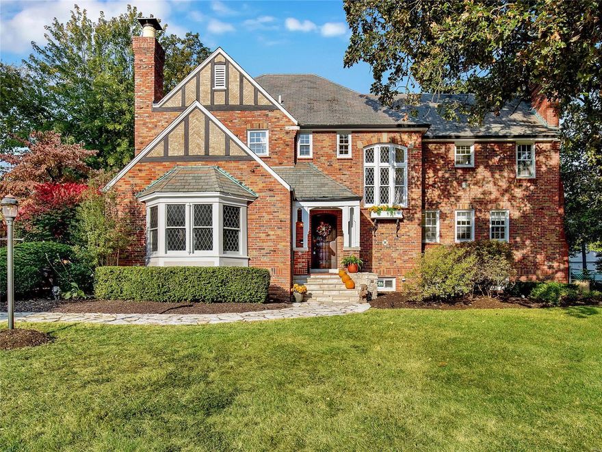 Classic Tudor, perfectly situated on a large lot in coveted Sherwood Forest. This home will wow you with original millwork and attention to detail. The sprawling first floor has many spaces and a thoughtful layout that is perfect for hosting a large party or small gatherings. The great room features a picturesque bay window, gas fireplace and dramatic wood beam ceiling. The updated kitchen features a large farm sink that gives a perfect view of the backyard oasis, that includes tiered patio/decks and a pool! What a wonderful time to own a pool! Upstairs you will find a master bedroom suite, which is beautiful as is, but could also be EXPANDED into a spare room behind it very easily. Four additional bedrooms, & plenty of closet space, both in the hallways and bedrooms. A well appointed laundry room completes the 2nd floor. The lower level has a storage space, a rec room, and another laundry area.  The architectural details and the prized location of this home make it a special offering!