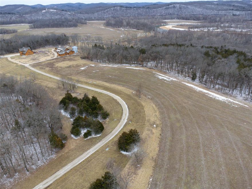 Exceptional 400-Acre Estate with multiple trails leading to the to the Meramec River, where you can drop in. Easy float to Allenton Fish Access. The 6,500 SF Farmhouse features 3 bedrooms, 3 full bathrooms, open concept with panoramic views of Meramec River with 1,000 SF patio. Three level Barn includes 2,019 SF garage space to store all recreational vehicles. Second level consists of 3,235 SF of exquisite entertaining space. The third level is an open floor plan with a full kitchen, sleeps six. Potential uses include an Equestrian Estate, Agricultural Ventures, Residential Development, and Recreational Retreat (hunting/fishing). Property addresses include 6331 and 6365 Horneker Rd, Eureka, MO