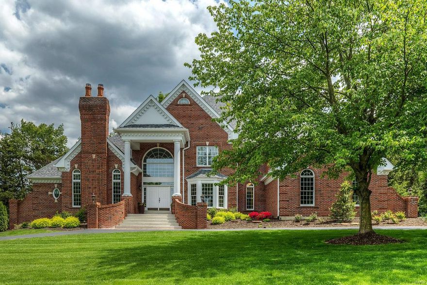 Beautifully designed 1.5-sty Estate home from award-winning builder Deshetler Homes! Impressive 2-sty marble foyer leads to library-paneled study with bookcases & brick fireplace, elegant dining room & stunning great room with wet bar & marble fireplace flanked by palladian windows. Chef’s kitchen with 42” glazed cabinetry, granite countertops, commercial grade appliances & butler’s pantry adjoins breakfast room with convenient planning center & vaulted hearth room with skylights & stone fireplace. Coffered master bedroom suite with wide bay window, sitting area & lavish bath with shower spa offers an appealing retreat. Front & rear staircases access 3 additional bedrooms, 1 with ensuite bath & 2 with Jack n’ Jill bath, plus bonus loft room. Lower Level includes recreation room with fireplace & wet bar, game room, office & full bath. Situated on a 1-acre cul-de-sac lot with patio with grilling station & full-height stone fireplace & resort-style pool surrounded by landscaped gardens.