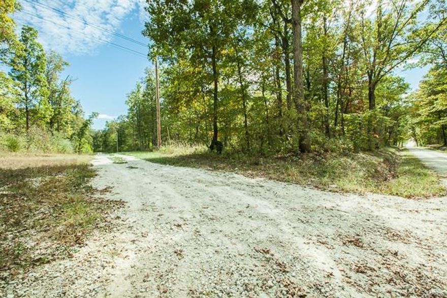4.19 WOODED ARES ON A CUL DE SAC BACKING TO CREEK AND ALREADY CLEARED FOR HOME SITE! ATV AND RV APPROVED AND DEED RESTRICTIONS. PROPERTY ALSO ADJOINS  TO ADDITIONAL 4.7 ACRE TRACT THAT CAN BE PURCHASED. BEAUTIFUL CANOPY OF TREES AND HOME CAN BE NESTLED IN WITH THE MAJORITY OF PROPERTY BEHIND THE HOME FOR FULL ENJOYMENT. CREEK IS BEAUTIFUL FULL OR LOW AND WALKING IS VERY EASY THRU THE PROPERTY. SIGN IS CENTERED ON ROAD TO SHOW THE MIDDLE OF PROPERTY. SURVEY AT THE OFFICE AND WELL BID HAS ALREADY BEEN COMPLETED.