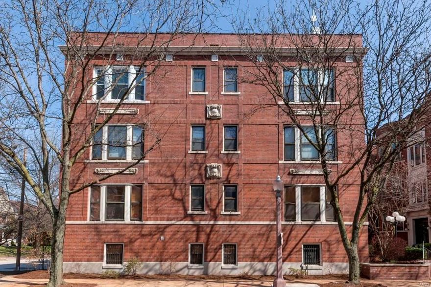Want to be in the center of all this action? This 2 Bd, 2 Bth condo is a great find! Enter the courtyard & enjoy the historical charm of this 100+ yr old property! As you enter the unit, w/patterned-inlay hardwood floors, 9' box-beamed ceilings, newer fixtures, period molding, exposed brick & walls of windows!  The Entry opens to the Dining Rm and leads to the light-filled Living Rm w/gorgeous coffered ceiling that leads to the Kitchen which boasts wood cabinetry, ample counter space & a gas cooktop. The two Bds each enjoy their own separate Bths, w/tile floors, large windows that reveal tons of natural light, & updated fixtures. Also included: in-unit laundry, 2 dedicated off-street parking spaces, & large storage area in the LL! Walk to the heart of the Central West End and enjoy its great shops and restaurants; also convenient to major university and medical facilities! Location: End Unit, Upper Level