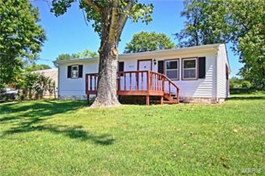 Turn-Key home ready for occupancy. This cute ranch style home is on a large corner lot and some partial fencing.  The front wooden deck is ample for entertaining and once inside you can appreciate the large living room and direct access to the rear facing kitchen. New carpets, fresh coat of paint and plenty of updates throughout are evident. the center hall plan of this home make it convenient and cozy. Updated appliances, cabinets and flooring in the kitchen have recently been installed.  A large carport to the rear of the property is convenient and large enough to accommodate a large vehicle or several small ones. Great Hillsboro schools and ultra convenient location.