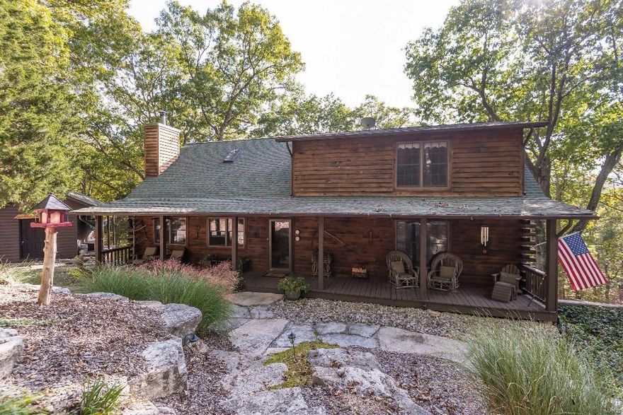 PRICED UNDER RECENT APPRAISAL!This secluded 'retreat' that's 'in town' on 3.72 acres in heart of Chesterfield/Wildwood.Lower level is perfect for guest suite with its own full bath.A log home w/3 detached outbuildings for all your passions-Are you an artist? Collector?Writer?Hunter?Wildlife enthusiast? Tranquility without the big commute!The owners have lovingly created their paradise with comfort&organized living in mind.The decks are the size of some yards.They are used as the 'back yard' complete with party area, barbecue&bar area,dining area-entertain a few or several!Divided bedroom floorplan w/upper level master suite,a cool den/sitting room & a loft.Lower level has added storage, a family room&full bath.Garage is oversized & 'eat off the floor' clean!  The newest 'barn' has old doors&windows from a historic St. Louis City home&steel, galvanized siding&roof!!Newer hvac,updated baths&kitchen.Home warranty.Pond w/fish abuts property,OK to use,can see winter.Gotta see the pictures!!