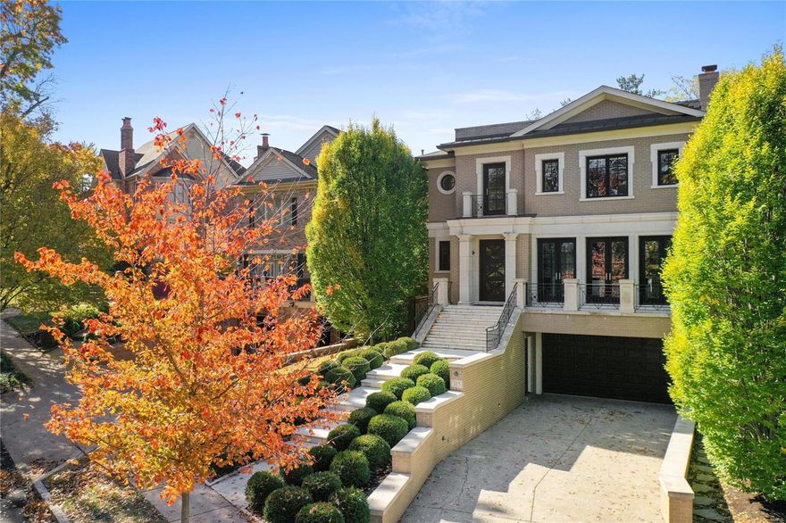 Designed by architect Dick Busch, this elegant, Old Town residence offers 4,442 sqft of luxury living. Beautifully selected finishes adorn each inch of this fabulous Clayton home.  3 sets of French doors open from the living room onto the front balcony offering gorgeous natural light. Separate dining room boasts glass chandelier & custom moldings. Stylish eat-in kitchen: Wolf & SubZero appliances housed in custom cabinetry, a spacious center island, & natural stone countertops. Hearth/Family room offers gas fireplace w stone surround & built-in bookcases. Covered rear terrace overlooks private back yard. 2nd floor Master suite w jetted soaking tub, walk-in shower, dual vanities & walk-in closets.  Upper level also incl. laundry room, office & 2 additional en-suite bedrooms. Lower level media/exercise room w full bath (option to convert to 4th bedroom). 4 car tandem garage & in-ground sprinkler system.  Elevator & Savant technology. 10' ceilings & hardwood floors throughout.