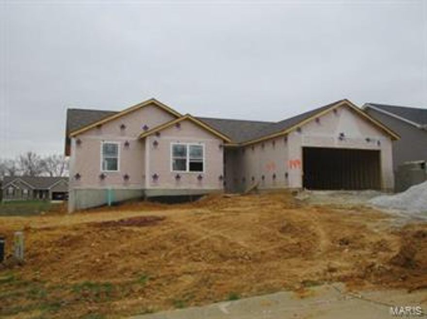 Quality throughout in this new 1504 sq ft home under construction-this home will have all the extras you could want including granite countertops, vaulted great room and kitchen-master bdrm with coffered ceilings and luxury bath with garden tub, dual sinks and separate shower-laminate hardwood floors throughout kitchen, living room and hallway-this home will Wow any picky buyer with all its upgrades-full walkout basement with r/i bathroom and walks out to patio-this is a wonderful place to relax, close to swimming, fishing, walking trails & more in Cuivre River State Park-