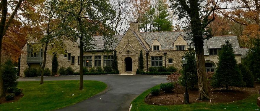 This 7,800 sq. ft. home is totally recreated for today's lifestyle while conserving impressive historic elements - the grand front hall showcases the original stone front exterior with the addition of 24' cathedral ceiling, 61' gallery hall & main staircase. Reclaimed elements mix with sophisticated finishes & high-end appliances: marble, slate, SubZero, Kohler. Stunning living room features a 6'x7' stone fireplace alcove with 5' depth, beamed ceiling, a mix of paneling & plaster finish on the walls, hardwood floors & French doors to sunroom. Marble kitchen with white plaster ceiling & walls opens to the dining room, garden room, family room, 2nd staircase, informal entry & downstairs to the wine room. Luxurious master suite with beamed cathedral ceiling, white marble bath & His & Her closets. 3 additional bedroom suites with marble baths, plus separate bedroom suite 5 with deck located off of the great room. Office. 3-car garage & cubbies. Beautiful gardens, lawn & croquet pitch. Additional Rooms: Sun Room