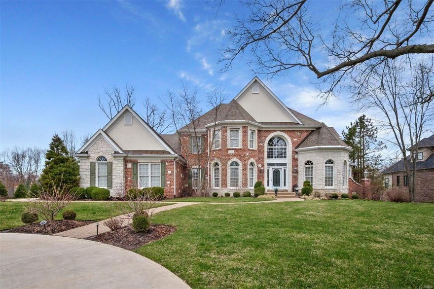 Nestled on just under 1-acre in Frontenac's heart, this 17-year-NEW home provides 4,778 sqft of open living spaces for today's discerning buyer. Two-story entry with great room, dining room, study, master suite, and open kitchen to hearth room on main. Butlers pantry connects the kitchen to the dining room for easy entertaining, as well as an open bar to the living room. Three additional bedroom suites on upper, front, and back staircase plus over 2,000 sqft of finish and full bath in the walkout lower level offering ample ceiling height, a bar, rec room with fireplace plus an office space, and additional finish for bedroom or workout space. 3-car garage and plenty of room for a pool. Ladue Schools, close to shopping, dining, and easy highway access to the area's most exceptional hospitals.
