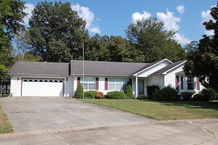 Lovely, Clean 3 bedroom, 2 bath home featuring  living room, family room, and formal dining room. Bay windows and tray ceilings in dining room and master bedroom. Storage and hobby room. 2 car over sized attached garage. Open deck in back and a shed.              Heat pump, underground utilities and tons of storage!