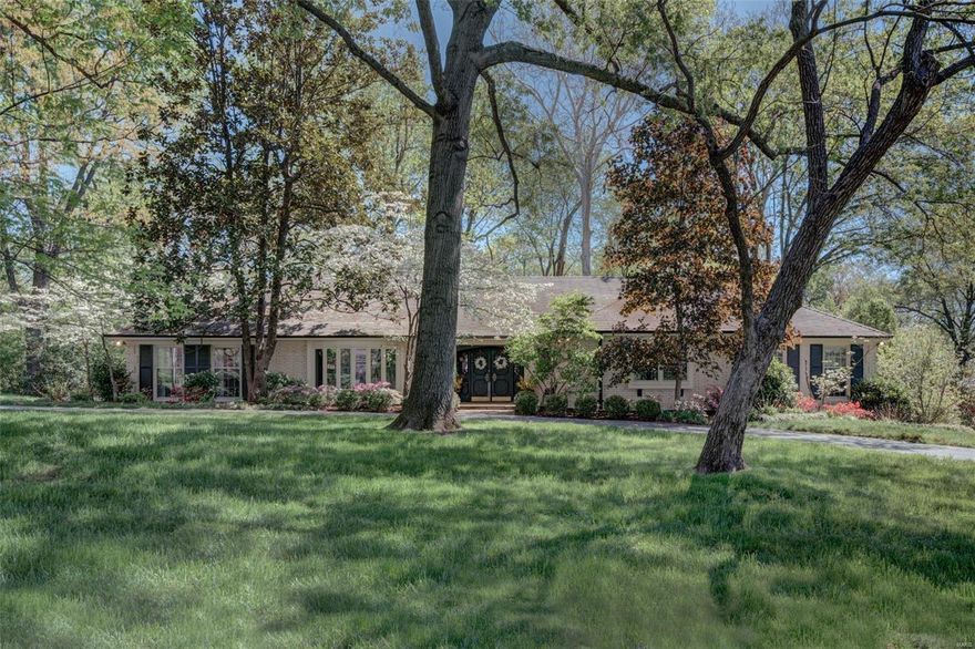 Fantastic  3 bed, 4.5 bath ranch home w/ 3850 sq ft of living space near Old Warson CC on gorgeous .75 acre. Features: hardwood floors, running plaster crown, millwork, updated full baths, recessed lights & speakers. Formal living rm w/ bow window & gas fireplace, dining room w/ china closet, & powder room. Enhanced original kitchen features: rare wood St. Charles cabinetry w/ metal accents, 5 burner Dacor cooktop, Subzero refrigerator, double SS KitchenAid wall ovens & dishwasher. Breakfast room overlooking rear terrace, hearth room w/ recessed work space & wet bar w/ under counter icemaker & wine refrigerator. Master suite w/ dressing room & bath w/ separate shower, air tub, marble surround & heated floors. Large secondary bedrooms & office finish main floor. LL w/ wet bar, full bath, family rm, sitting rm & rec rm walks out to terrace. Lots of finished & unfinished storage spaces. Oversized 2 car garage can be reconfigured to fit a golf cart. Ultra private backyard! Must see!
