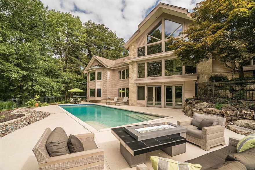 Private. Serene. Sumptuous. It’s paradise for sale & the views alone are worth the price! Babler Park views from every window & impeccable in every detail, this secluded 4BR/3.5ba ranch offers 5800 finished sf. Dazzling dream kitchen - Gaggenau appliances, marble waterfall-island, honed quartz counters, custom cabs, & an amazing beverage station. Glittering beauty! Highlights: 2sty Great Rm, octagonal Hearth Rm, lg walk-in pantry, Loft/Den, main floor Master Ste, Fam Rm w/wet bar, utility/fitness rm, 3 car prof fin garage, security sys, water softener. Updates: Refinished hardwood floors, new carpet, fresh paint, powder room remodel, Legrande Adorne outlets & soft-touch switches, Geothermal HVAC 2019, whole house 200amp Generac generator 2019 & so much more! 20x40’ saltwater pool, front yard fountain & sprinkler sys. Nestled comfortably on 1.5 acres, minutes to Chesterfield Valley & Hwy 40 in Rockwood School District. Life is short, live magnificently in Wildhorse Spring Farm!