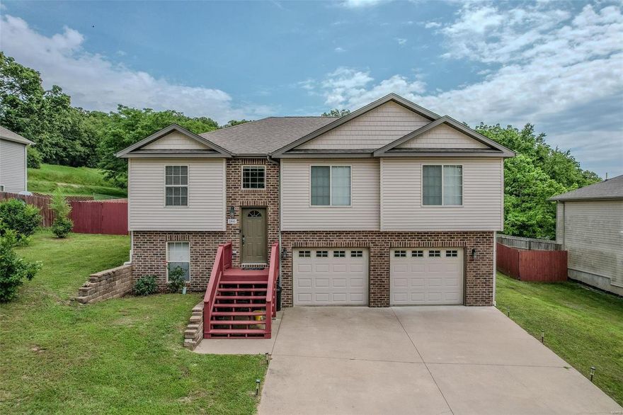 Welcome to this stunning 4-bedroom, 3-bathroom home located in the highly sought-after Pioneer Ridge Subdivision, within the Waynesville School District and just a short drive to the West Gate of Fort Leonard Wood. This home features a spacious open main living area with vaulted ceilings, creating a bright and airy atmosphere. The master suite offers a tray ceiling, a large bathroom and a walk-in closet for your convenience. Enjoy outdoor living with recently stained front and back decks, perfect for relaxing or entertaining. The fully fenced backyard is ideal for kids and pets to play freely. The lower level boasts a large family room, an additional spacious bedroom, and access to an oversized 2-car garage, providing ample room for vehicles, projects, or a home gym. Don’t miss out on this perfect blend of comfort and functionality in a prime location!
Be sure to check out the virtual drone tour!