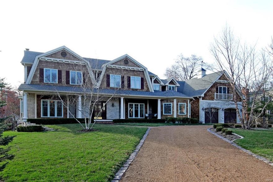 Exceptional fully customized Cape Cod in a lovely Norman Rockwell like neighborhood. This magnificent 5 bedroom/4.5 bath home provides every amenity imaginable. It boasts many features you would find in an old world mansion: a vestibule opens to a 14 x 12 entry with marble floors and stain glass doors, incredible moldings and wainscoting, chefs kitchen and hearth room, 2 butlers pantries, 2 staircases, upstairs family room and wet bar, and 7 fireplaces. Luxurious master suite. First floor guest suite, inviting rear deck 35 x 12; endless possibilities with lower level and oversized 2+ tandem garage. Walk able to Kirkwood's charming downtown.
