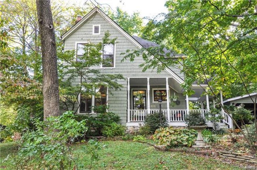 Est. 1910. A spacious wrap around porch welcomes you to this Webster charmer!  Enjoy the beautiful hardwood floors and tall ceilings throughout the first floor. The large living living room with bay window, built-in window seat and fireplace is the perfect room to relax in. Easy entertaining with a big kitchen that opens up to a large family room and formal dining room. Two sets of french doors in the family room lead out to a large, wrap around deck - perfect for enjoying a nice fall evening. Lovely full bath and main floor laundry round out the first floor. The second floor offers an amazing master suite with sitting room and bath with double vanity along with two other nice sized bedrooms and a 2nd bathroom!  Enjoy a quick walk to all of the shops and restaurants that Old Orchard has to offer.