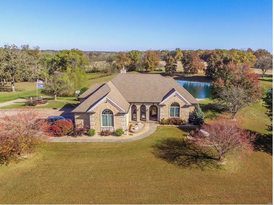Luxurious Country Estate! Fabulous 5200 sq ft, 3BR/3.5BA Full Brick home on 45 parklike acres! Step inside & feel the elegance of the formal dining rm w/ built-in custom cabinets & hardwood floor & the palladian windows in the great rm offering a gorgeous view. Amazing Master BR w/ coffered ceiling & deck access. Master bath has a Jacuzzi tub, separate steam shower, dual vanities, & large walk-in closet. Custom kitchen w/ new glass cooktop, granite countertops, 42" cabinets, & 2 sided fireplace. Fully finished w/o basement has a full kitchen & bar, living rm, sleeping area, BA, & rec area. Other features: 10’ ceilings, Geothermal heat, MF laundry,  3 car garage attached garage. Exterior boasts a stamped concrete driveway, fountain, deck w/ gazebo & dual staircase, 15X36 inground pool, 2 ac pond, & 64X48 shed w/ 16X64 attached lean-to. Small home-currently rented for $550/month. Income producing- 22+/- acres in crops. This type of estate is rarely offered & will not disappoint!