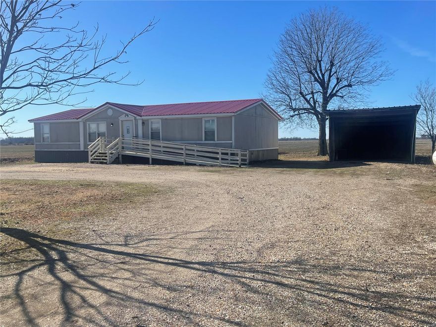 1997 double wide home on .44 acres just outside of Fisk.  This home has 3 bedrooms, 2 baths and an open floor plan kitchen, dining room, living room.  Home also has a large family room with gas log fireplace.  There is a large metal shed for all your stuff.  Listed at only $65,900.00.  Property is being sold AS IS!!!