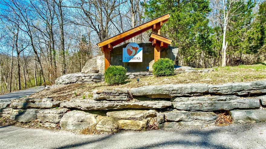 Tucked within the Timbers at Fox Mountain, a Wildwood community served by Rockwood School District, this 11.5 acre wooded lot offers a rare opportunity to create your dream escape! With gently rolling hills, mature trees, and paved roads leading you to the homesite, the setting is serene and secluded- a place you could truly unwind. Whether you’re imagining a modern farmhouse, a private family estate, or an incredible weekend retreat, this property offers both the space and flexibility to bring your vision to life! The lot’s natural topography is ideal for a walkout lower level, and with electric already in the neighborhood, you’re ready to build. Located just minutes from Wildwood Town Center, Babler State Park, and top-rated Rockwood schools, this homesite blends the best of nature and convenience. Enjoy wildlife and beautiful scenic views!  Take a minute to view the short drone video attached to the listing!