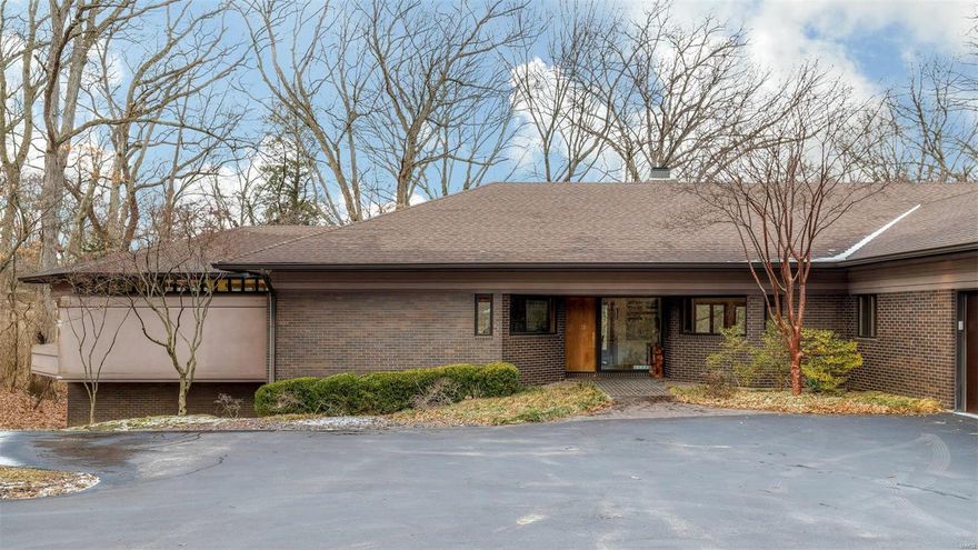 lmagine a home designed to offer a casual, yet modern lifestyle with open spaces separated by an occasional low wall, natural light flooding the rooms from skylights and abundance of windows-this is that home. Surrounded by trees and very private, the home sits on just under an acre and a half. The main floor has all essentialspaces-- Great Room w/ limestone surrounded fireplace, dining room, totally open gourmet kitchen w/ all the bells and whistles, breakfast room immediately adjacent, cozy game room, oversized Master Suite w/ private sitting room and terrace, a grand office, and a screened porch to enjoy the views. The lower level has 3 additional bedrooms, 2 baths, a family room & tons of storage. 2 of the bedrooms have walkouts to LL outdoor space. There are 5 garage spaces-a car lovers dream. Located in Ladue Schools and convenient to everything-This is that very special home. Additional Rooms: Mud Room