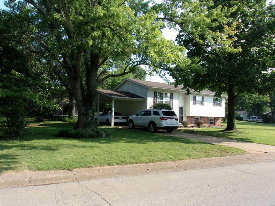 Great location on large  corner lot has nice shade trees, raised garden beds and  newly stained deck overlooking.  Spacious home had 3 bedrooms up and one in lower level  1 full bath up and nice bath with shower in lower level. this home has added very nice ceramic tile throughout. Stainless  appliances stay in kitchen also has pantry. Great large  area in  lower level has beautiful plank wood look ceramic tile,  speakers are wired and recessed lighting. New 40 gallon  water heater just installed and roof and gutters just completed!